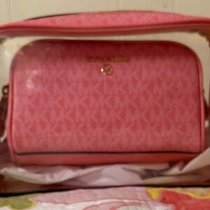 Pink Micheal Kor cosmetics bag